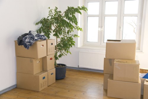 Removals team loading boxes and furniture for a South Kensington relocation