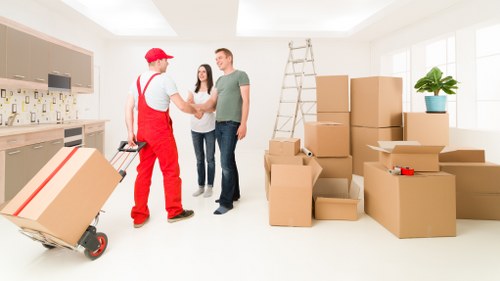 Moving team loading household items for a South Kensington property relocation