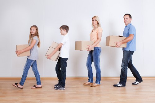 Loading household items into a removal truck for a South Kensington relocation