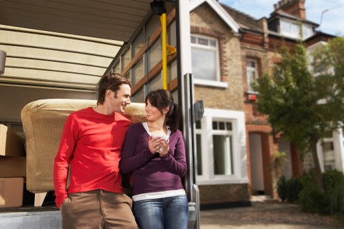 Local moving van navigating residential streets in South Kensington