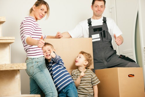 Packed office boxes and labelled equipment ready for a South Kensington move